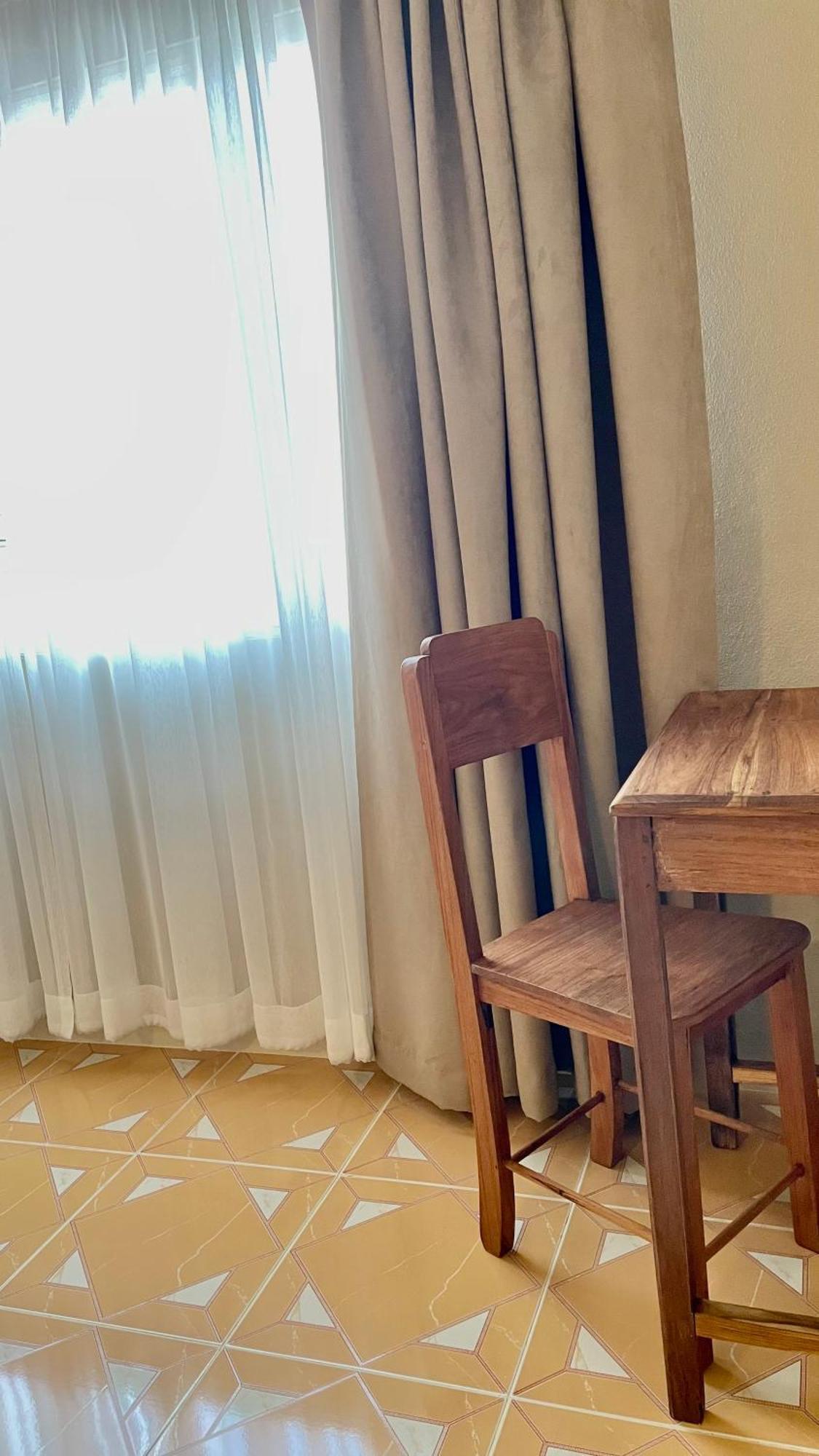 Ay's House Aparthotel