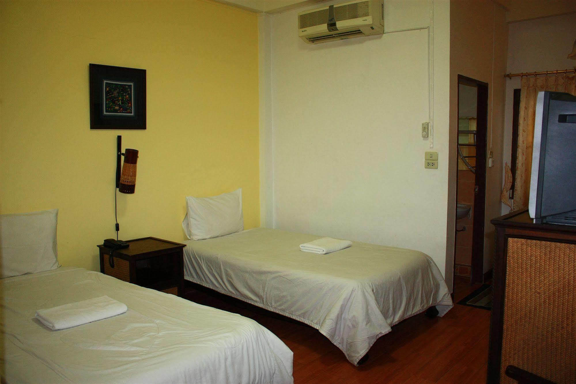 โรงแรมตีฆ้อง - Tri Gong Gasthof Chiang Mai